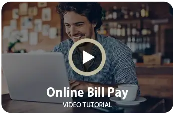paying bills online smiling in shop